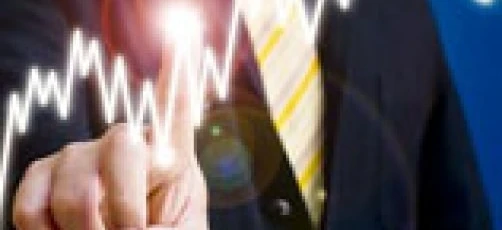 A businessperson making a thumb gesture with their hand. Exploring the science of body language in the workplace.